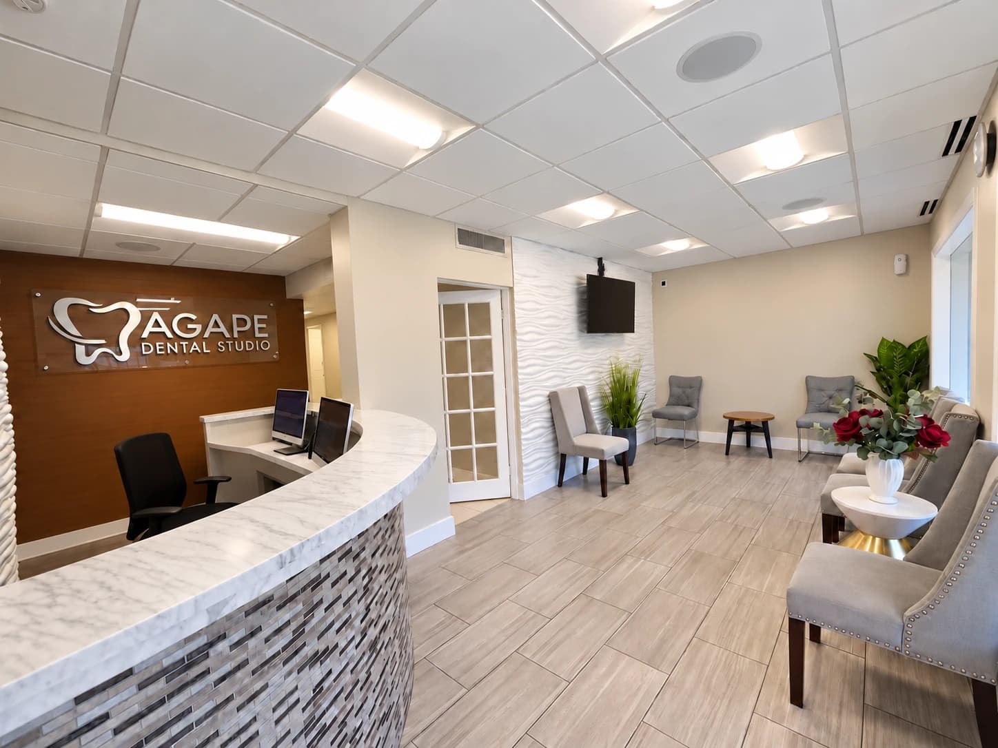 Reception desk and waiting area at Agape Dental Studio